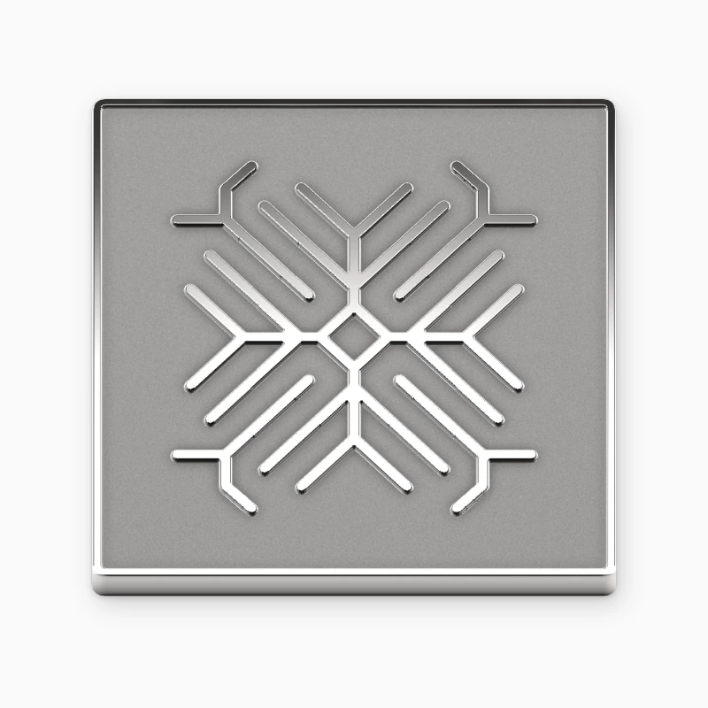 Pin troquelado plateado cuadrado con un patrón geométrico en relieve